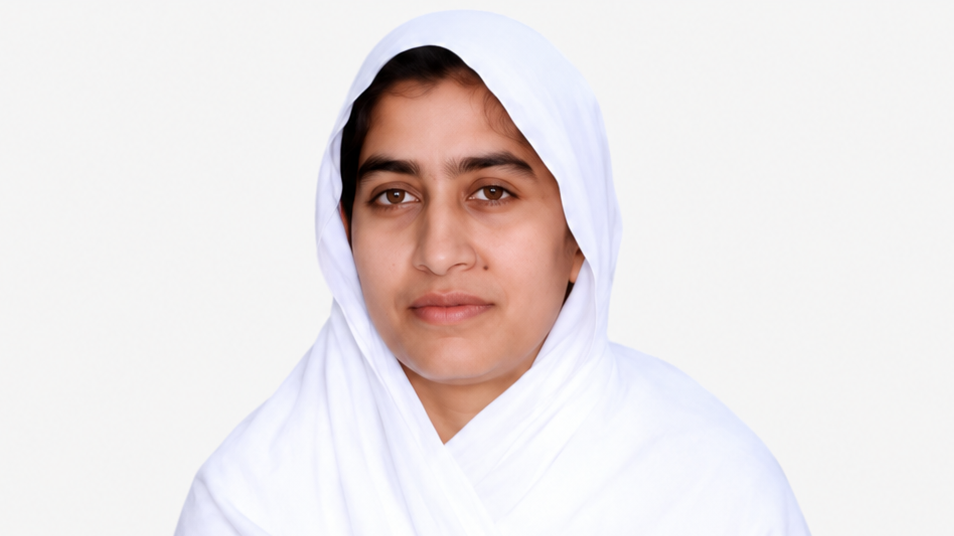 Portrait of a woman wearing a white hijab, facing the camera with a neutral expression.