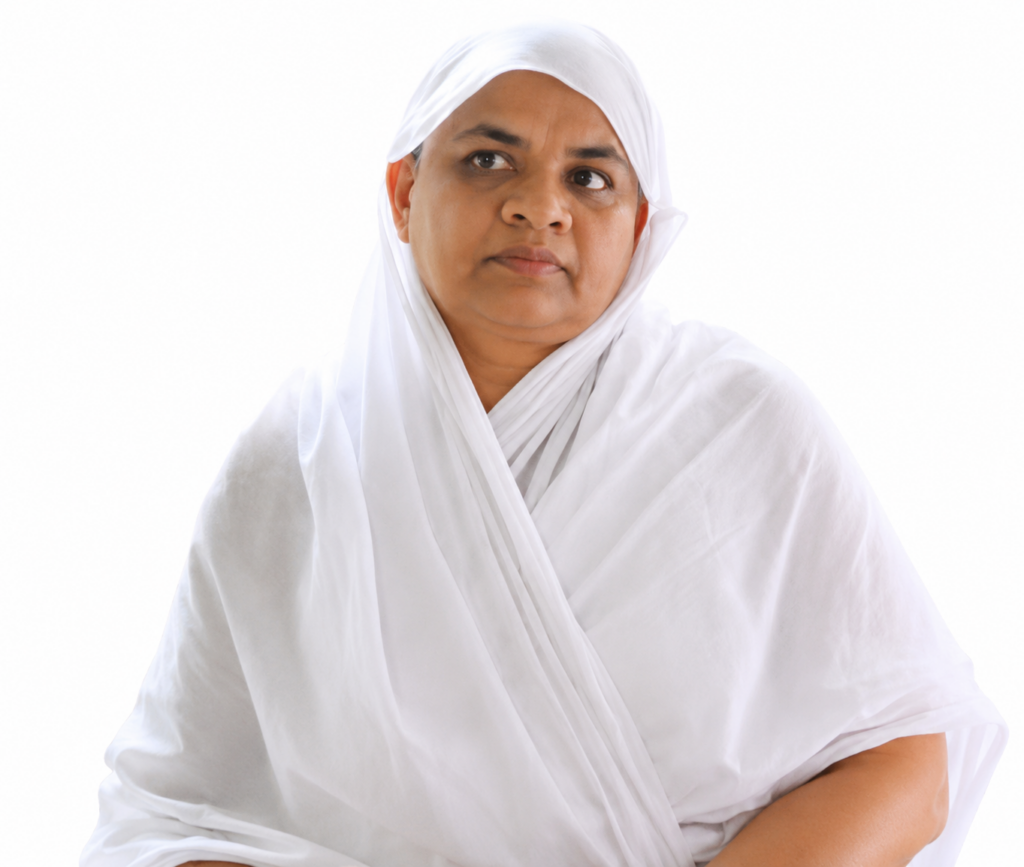 Portrait of a woman wearing a white headscarf and robe, looking slightly to the right.