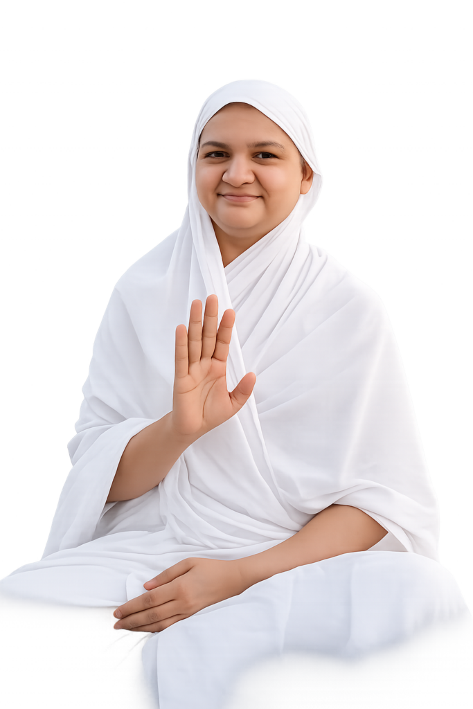 Smiling woman in a white hijab and robe sits cross-legged, raising her right hand with palm out as a stop signal.