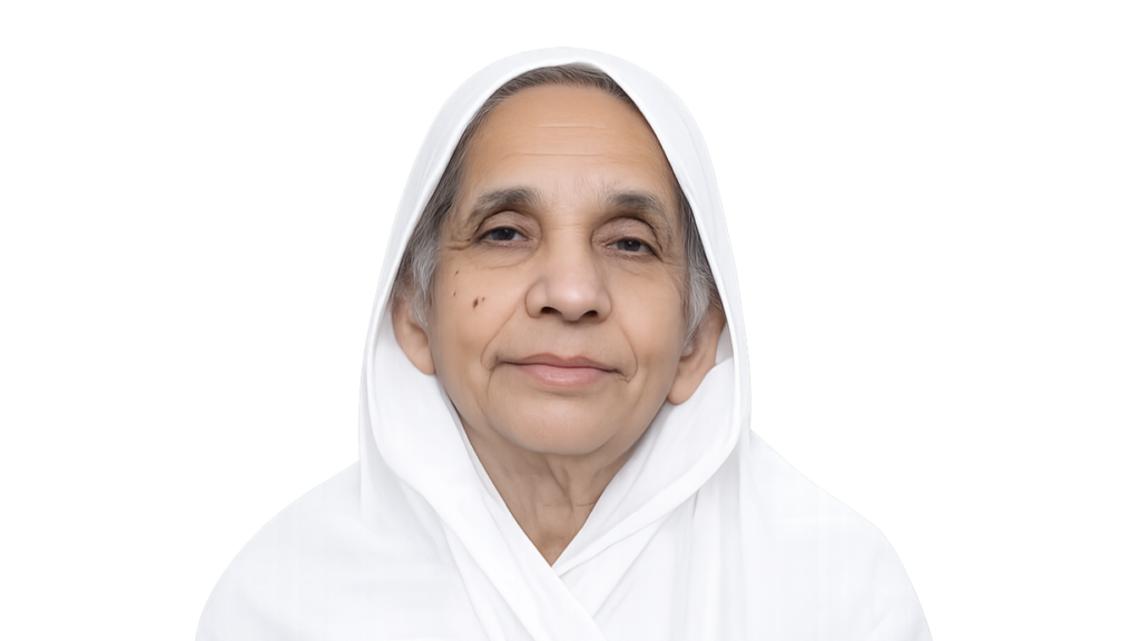Portrait of an elderly woman with a white headscarf, facing the camera with a calm, gentle expression.