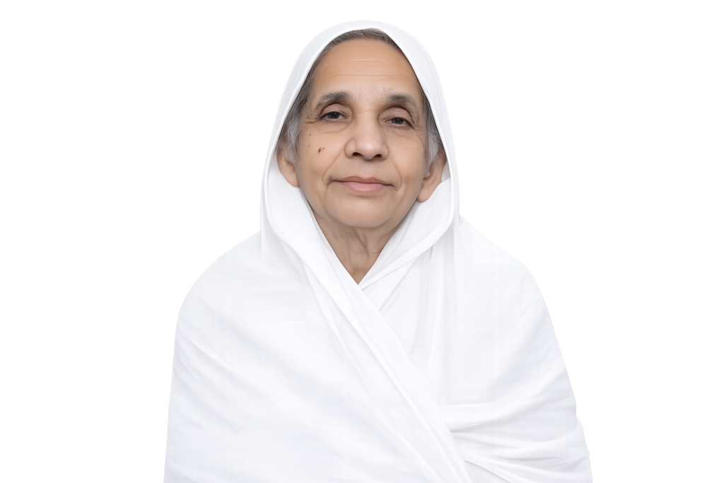 Portrait of an elderly woman in a white headscarf and robe, looking at the camera with a calm expression.