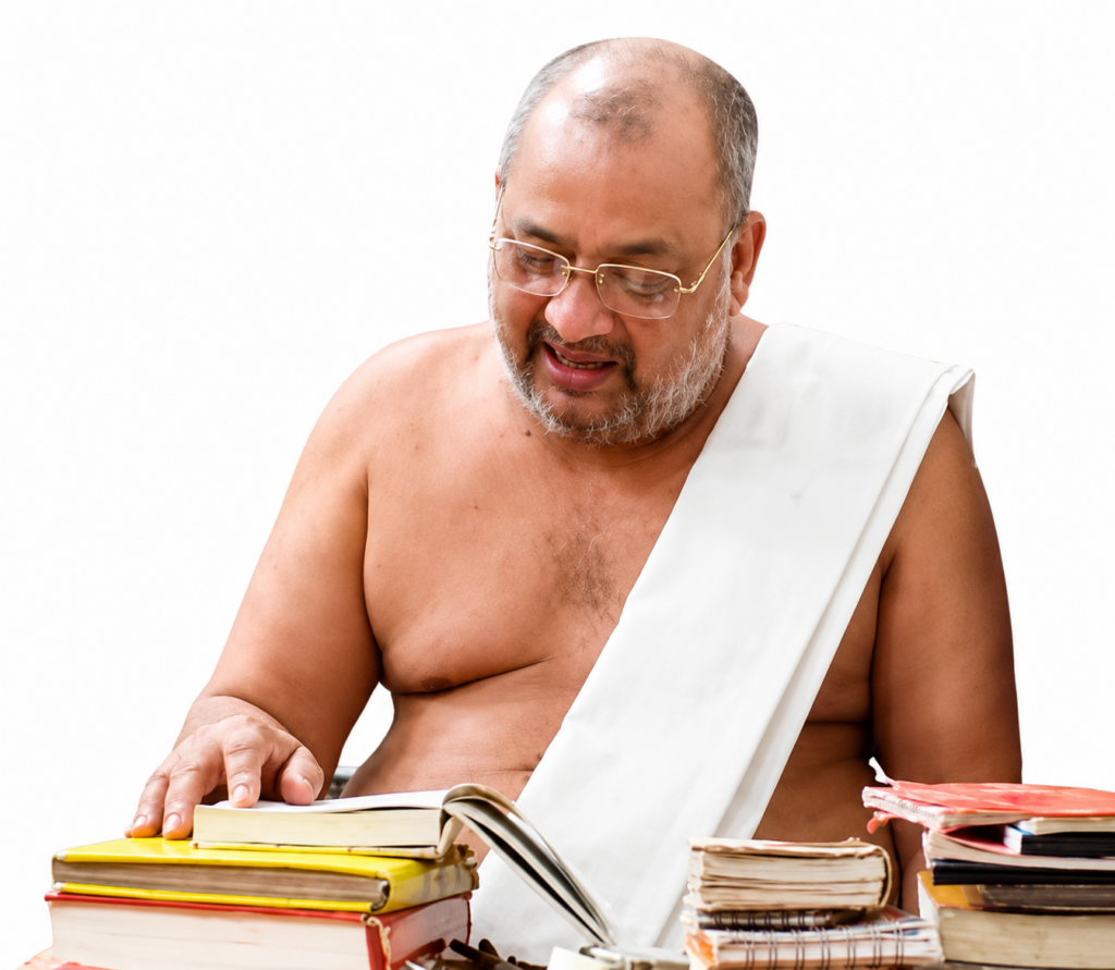 Older man with glasses and a white draped garment reads a book at a desk surrounded by colorful stacks of books on a white background.