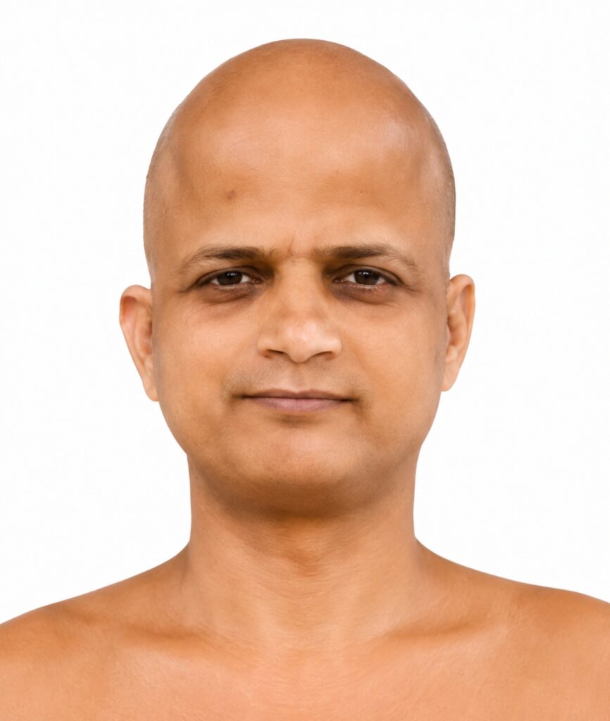 Front-facing portrait of a bald man with a neutral expression against a white background.