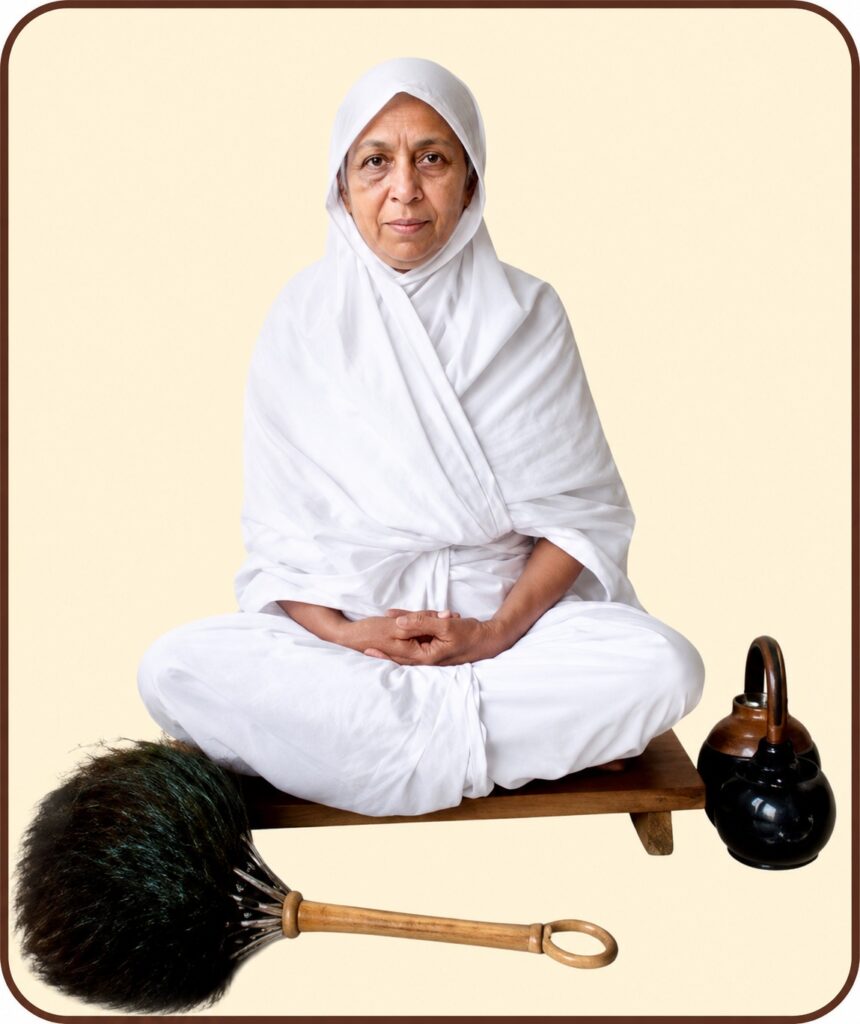 Older woman in white traditional dress sits cross-legged on a bench, meditating; a broom and kettle lie nearby.